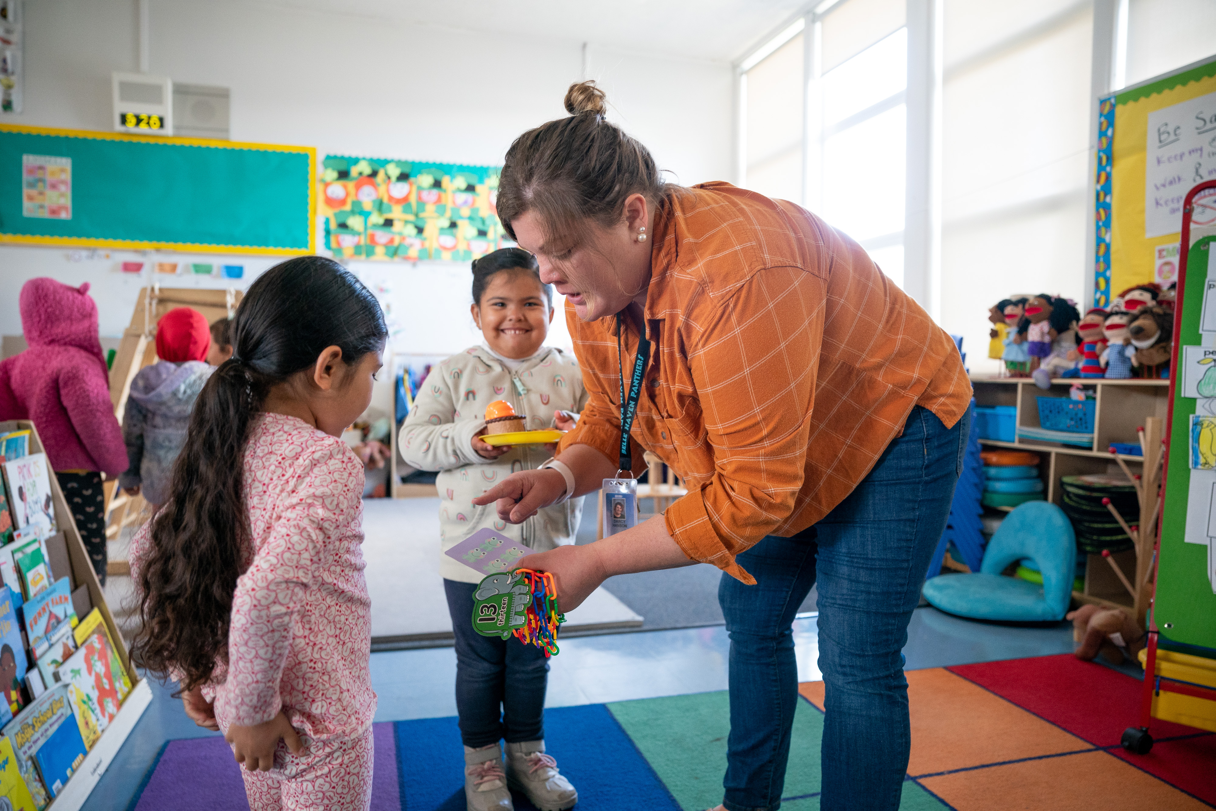 teacher with two students